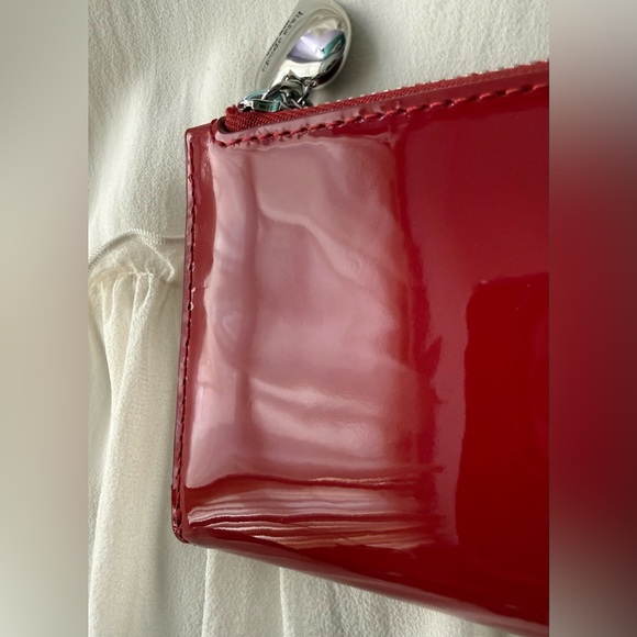 Kate Spade Devin Patent Bifold Wallet - Picture 2 of 15